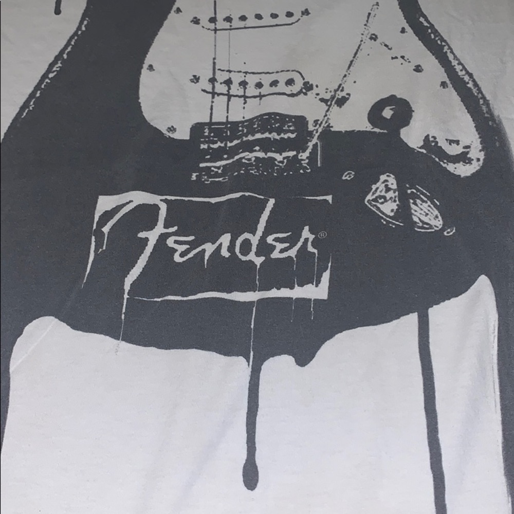 White fender graphic tee.